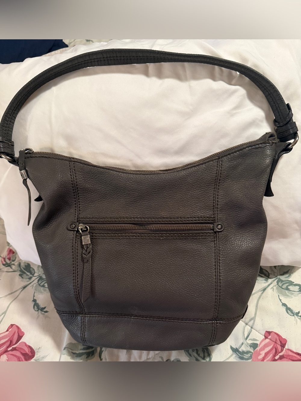 The Sak Sequoia Leather Hobo Bag in a dark gray or slate color